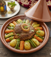 Le Paradis d'Escargot - Tajine d'agneau fondant accompagné de légumes et de semoule 1 personne