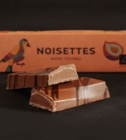 Chocolaterie Origines - Barre fourrées BIO chocolat lait 38% praliné noisettes