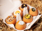 Compagnie Générale de Biscuiterie - Boite contenant 6 œufs en chocolat avec une présentation Coco, oranges confites, pistaches, Caviar